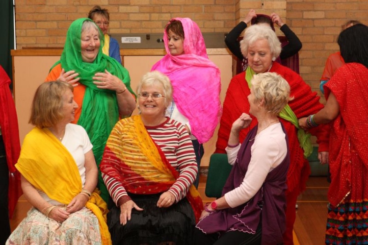 Seniors-have-a-chuckle-before-posing-for-Bollywood-photo